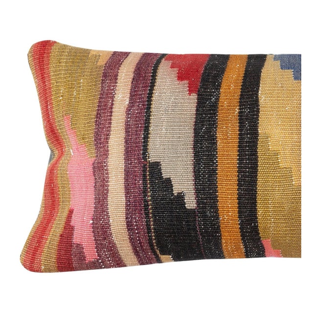 Add a touch of history and warmth to your space with this vintage handmade Turkish wool kilim cushion cover. Crafted from...