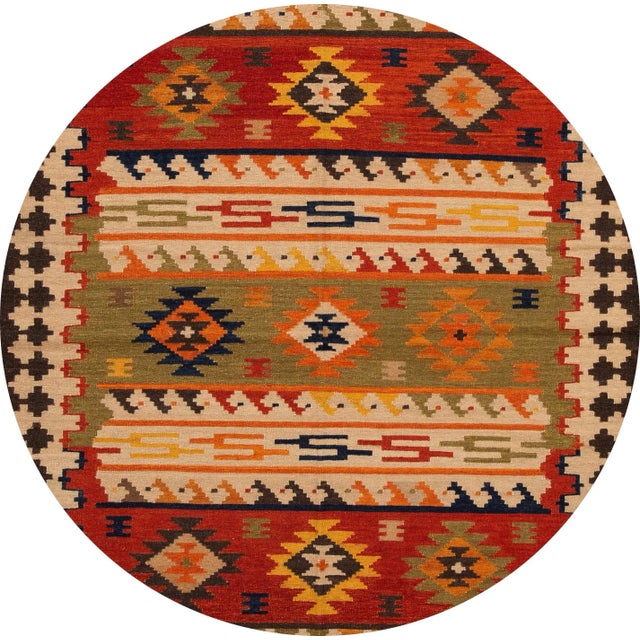 A beautiful hand-woven modern Kilim rug with an ivory field and multi-color accents in an all-over geometric design. This...