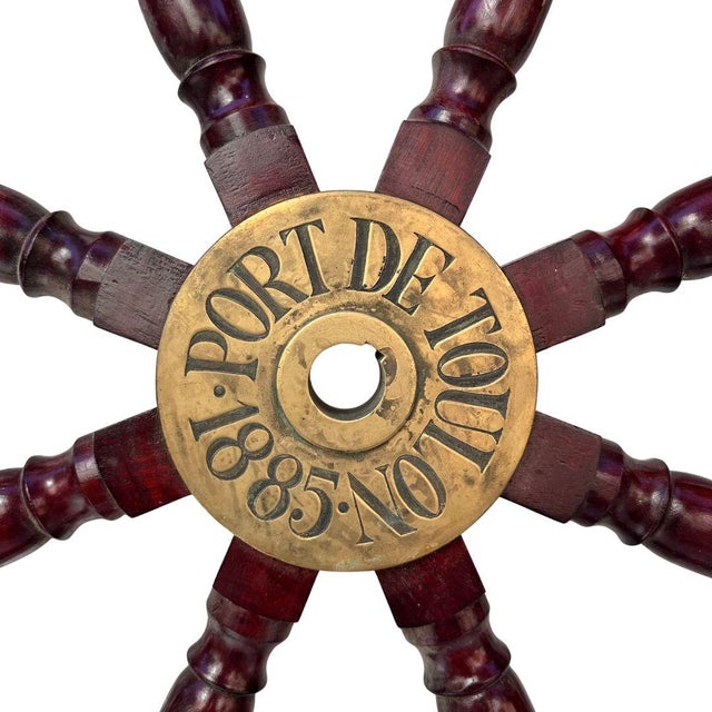 Ship's wheel “port de toulon 1885”, wood, napoleon iii era – france materials: wood and gilt brass period: 1880s, napoleon...