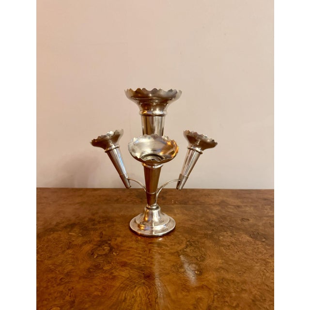 Antique Edwardian silver plated stunning table epergne, having a central fluted tapering vase flanked by three matching...