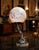 A glamorous original French Art Deco figural table lamp dating to circa 1930, combining a sculptural female dancer with...