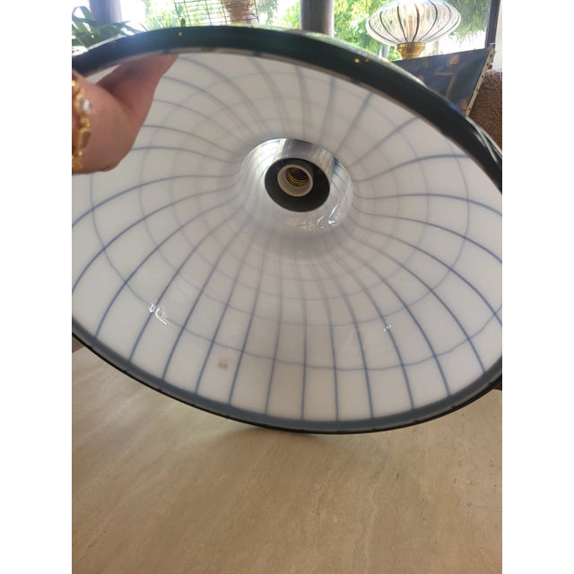 Murano blown glass pendant light by Fratelli Toso (authentication label present). Italy, 1980s. The brothers Angelo,...