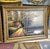 Bring the peaceful beauty of the countryside into your home with this charming landscape painting depicting a tranquil...