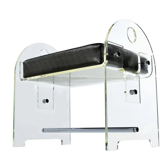 Stylish vintage Nineteen-Laties Lucite acrylic vanity benches have a unique quality. As one moves about the stools, you...