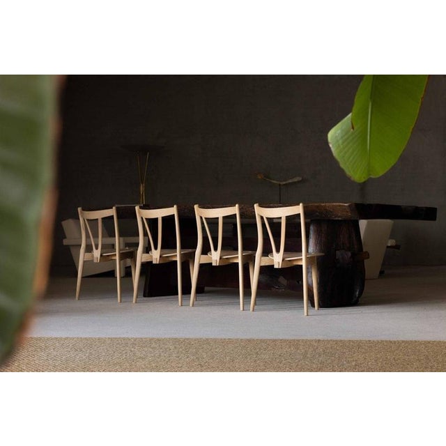 This super rare set of four pp51/3 chairs, often referred to as the v chair, represents a late and highly refined...