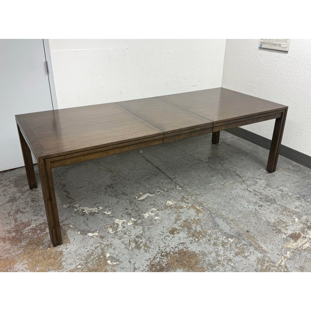 Design Plus Gallery presents the BambooTimbre Extension Table by Maria Yee for Crate & Barrel. This table has a brown...