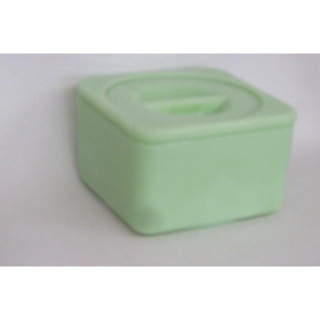 This gorgeous vintage Jadeite refrigerator dish / box is made of stunning uranium glass and appears to be from the 1930s....