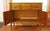 Circa 1930s French Directoire style small buffet. Walnut. Single drawers with 3 faux drawer facings over cabinet doors....