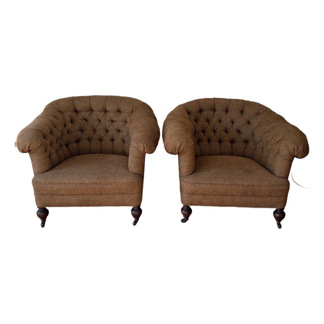 Pair of Chesterfield Tufted Deep Club Chairs With Turned Wooden Legs and Brass Casters For Sale