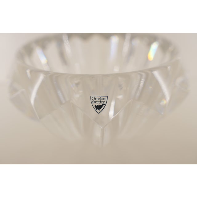 This vintage Orrefors “Zodiac” bowl showcases the elegant sculptural clarity that defines the line, with its distinctive...