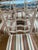 SET OF SIX CHIPPENDALE-STYLE RIBBON-BACK DINING CHAIRS Mid-20th Century In mahogany. Seats newly reupholstered with...
