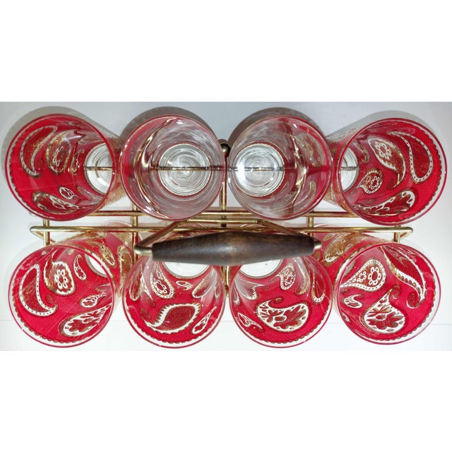 This vintage set of 8 Culver highball glasses was manufactured in the 1960s in Brooklyn, NY. The shiny cherry red finish...