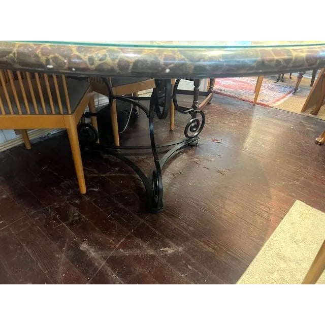 This large Fiberglass Top 5ft indoor outdoor patio dining table features a sturdy iron base with a glass top, making it...
