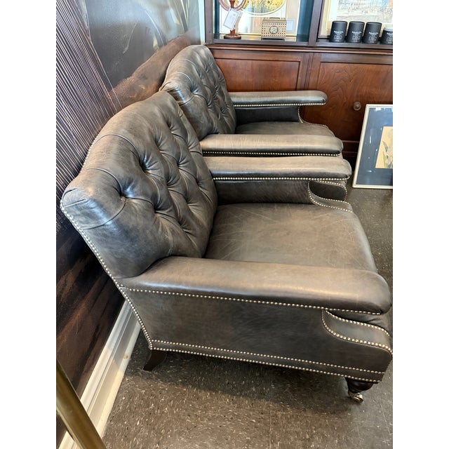 Set of two Ralph Lauren gray leather chairs, circa 2000. These chairs are wide, comfortable and ready for local pickup or...