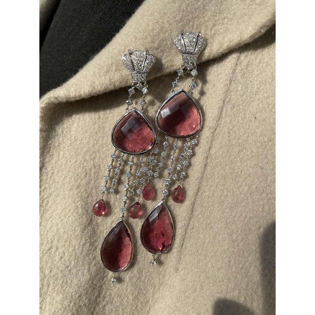 Ruby Dangle earrings to make a statement with your look. These earrings create a sparkling, luxurious look featuring mixed...