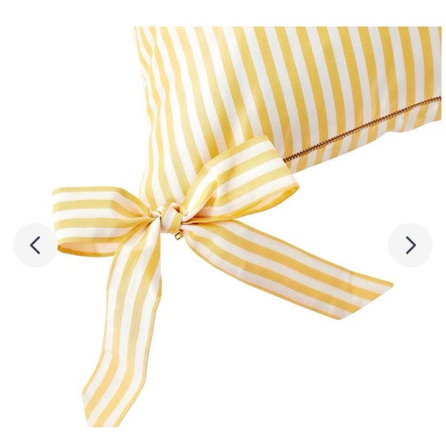 Pair of Silk Bow Pillows with Designer Down Inserts Bring a touch of timeless charm and designer elegance to any room with...
