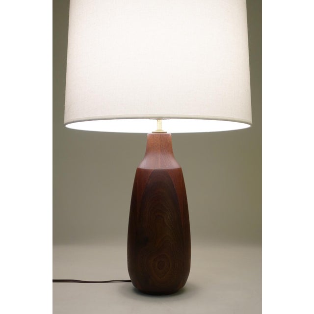 A bold and impressive Danish Mid Century Modern solid lathe turned staved Walnut "Bottle" table lamp design circa 1960's...