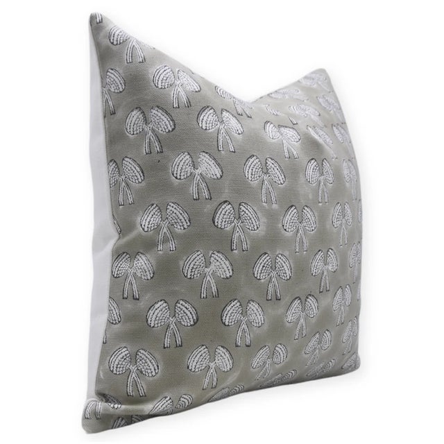 Bring home the charm of handcrafted tradition with this block print handmade cushion cover. Made from thick white cotton,...