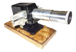 Kodak Slide Projector Circa 1939 on Travertine