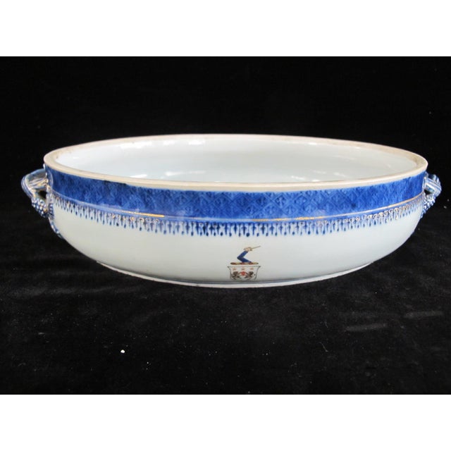 Antique Chinese export Nanking porcelain serving bowl with handles. Blue and white porcelain showing a village scene...