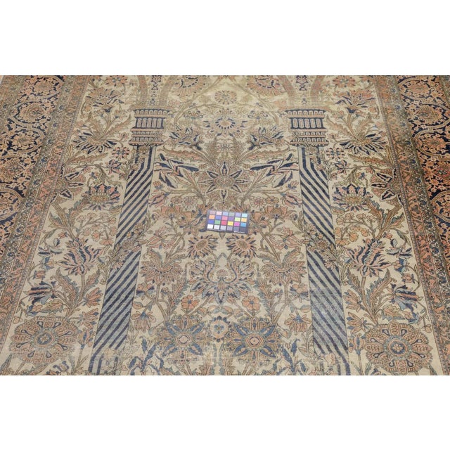 In fairly good condition, this velvety pile, short-clipped arcade pattern carpet shows two candy-cane striped pillars with...
