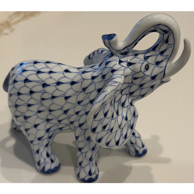 Elegant vintage Andrea by Sadek porcelain elephant figurine crafted in the classic Herend-style fishnet pattern. This...