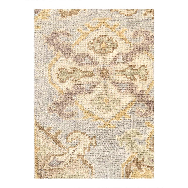 Hand knotted Turkish Oushak rug made of hand-spun lamb's wool rug and all natural dyes. Each rug has a dense, soft pile,...