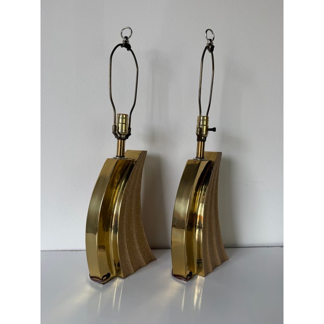 Striking pair of 1980s postmodern table lamps featuring a bold Art Deco–inspired silhouette. Each lamp showcases a...