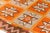 This is a vintage Turkish Oushak rug from the Mid 20th Century. The piece was hand-knotted.