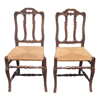 Pair of Antique French Provincial Style Ornate Carved Rush Seat Side Chairs For Sale