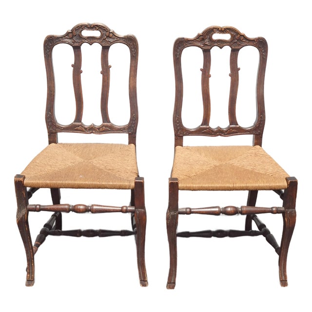 Pair of Antique French Provincial Style Ornate Carved Rush Seat Side Chairs For Sale