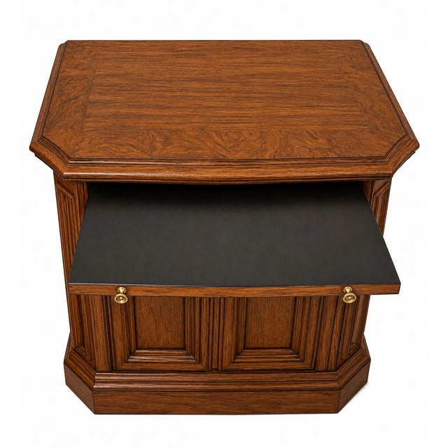 Thomasville Furniture Pageantry Collection night stand in oak with burl wood accents on door panels and pecan stain. It...