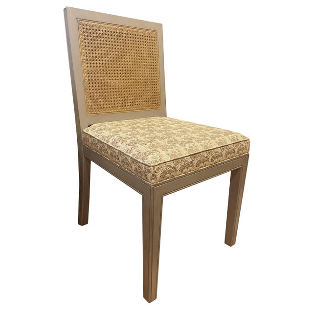 A set of four one-of-a-kind dining chairs, custom-made with a focus on detailed craftsmanship. Each chair features a hand-...