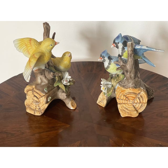 Pair of vintage Royal Crown bisque porcelain bird figurines sculptures.