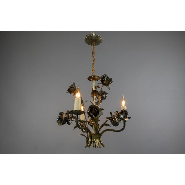 Sculptural French Hollywood Regency Style Floral Metal Chandelier with Three Lights, 1970s This elegant Hollywood...