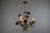 Sculptural French Hollywood Regency Style Floral Metal Chandelier with Three Lights, 1970s This elegant Hollywood...