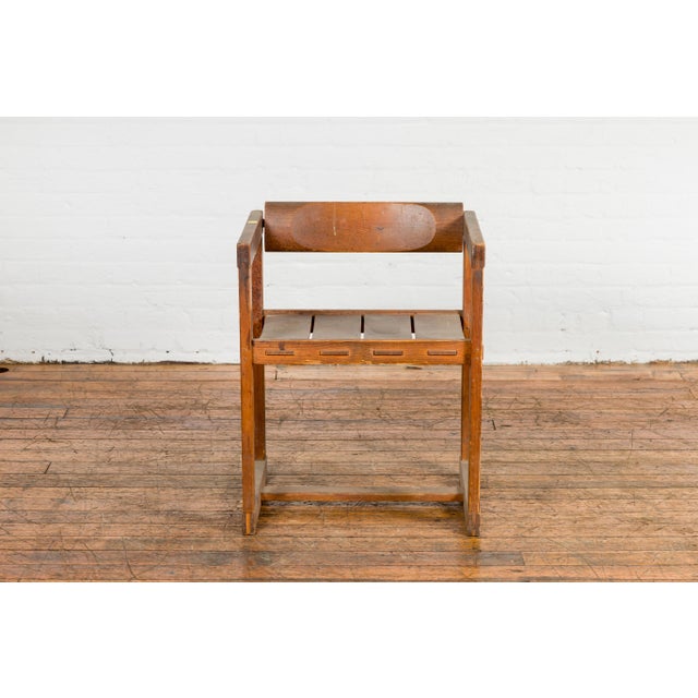 Introducing the epitome of rugged functionality: this Industrial-style vintage artist desk chair. With a slatted seat that...