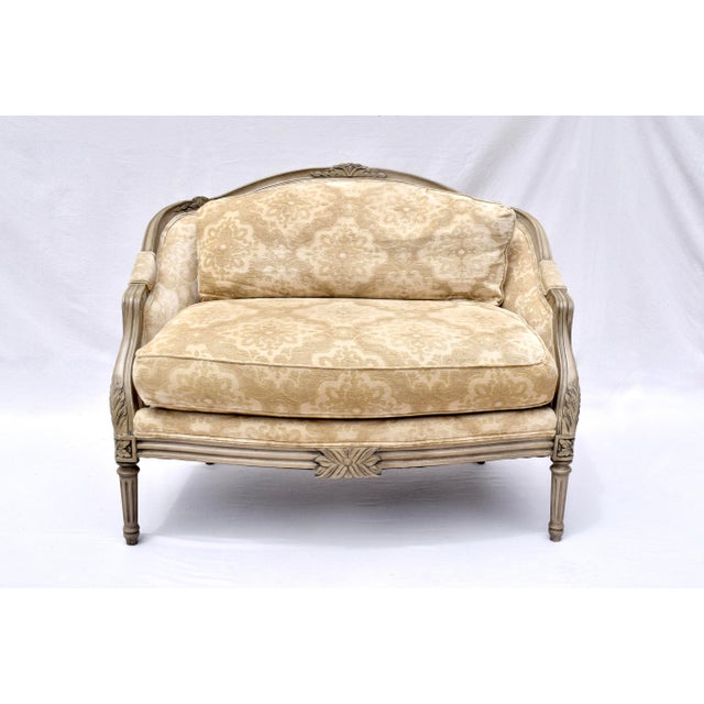 French Louis XvI Style Marquise Bergere Loveseat & Ottoman with distinct design elements of the period including hand-...