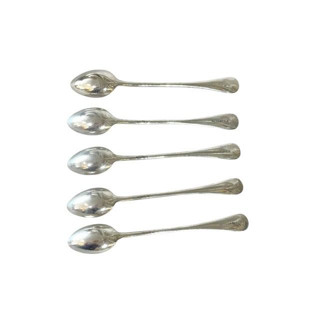 Amazing set of 10 long silver spoons by Wiskemann of Belgium. Each spoon has a makers mark as well as the name of the...