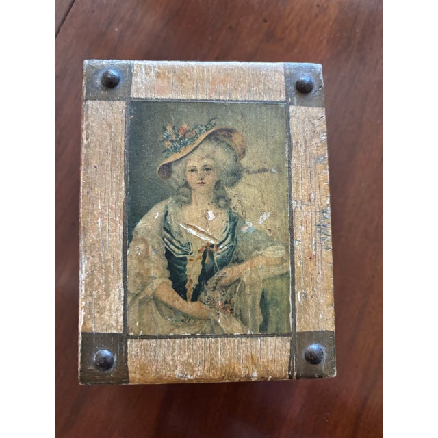 Very early French hinged wooden book box. Lovely pictures on exterior and interior. Shows fine detail in hinge work.