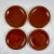 A set of four pottery terra cotta dishes, Vallauris, France, circa 1930s- 1950s. A traditional rustic design in a rich...