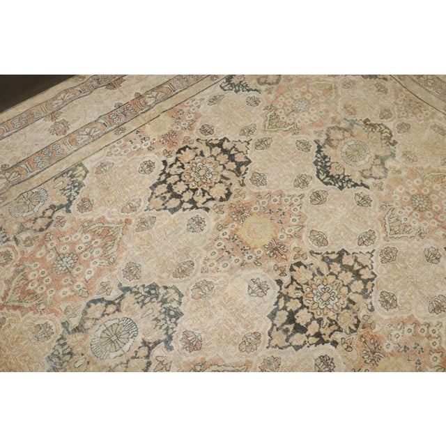 1910 Persian Yazd rug with a large scale open field design in neutral colors