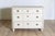 This Swedish chest of drawers is a fine example of Scandinavian craftsmanship and design. Constructed from pine, a wood...