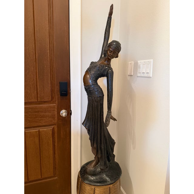 Stunning vintage Art Deco style bronze sculpture of a female dancer. Modeled after Demetre Chiparus's famous "Footsteps"...