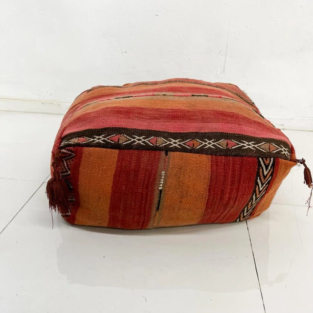 For your consideration, a 1970s vintage Moroccan kilim floor pillow cushion (Pouf). It features a hand-woven kilim fabric...