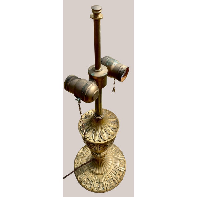 An antique MILLER SLAG GLASS PANELED AND LACQUERED GILT METAL TABLE LAMP, SIGNED, DOGWOOD PATTERN, PATENTED 1919, the...