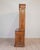 A handsome Italian 19th century walnut bookcase of exceptional scale and architectural presence, crafted in two parts with...