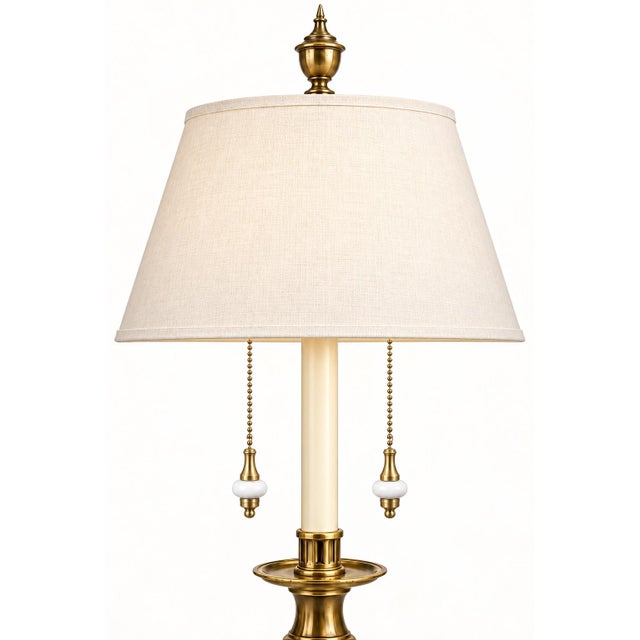 An extraordinary monumental vintage Stiffel table lamp combining neoclassical architecture, substantial scale, and refined...