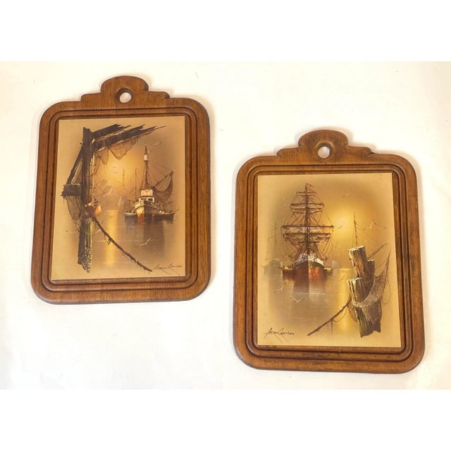 Vintage pair of ship prints on nice wood plaques.