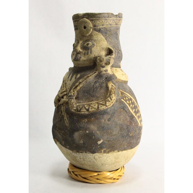 An impressive Figural Jar from the central coast of Peru All hand crafted, without the use of a pottery wheel, an...